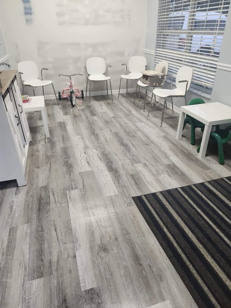 Spotless medical exam room with sanitized surfaces and organized workspace